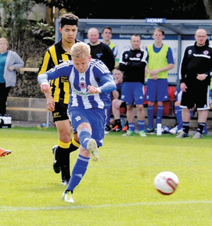 Main image for Local football round-up: Frost fires 14 as Wombwell win 28-0