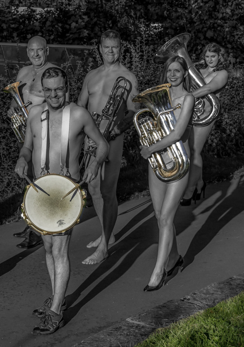 Main image for Band strips off for naked calendar.