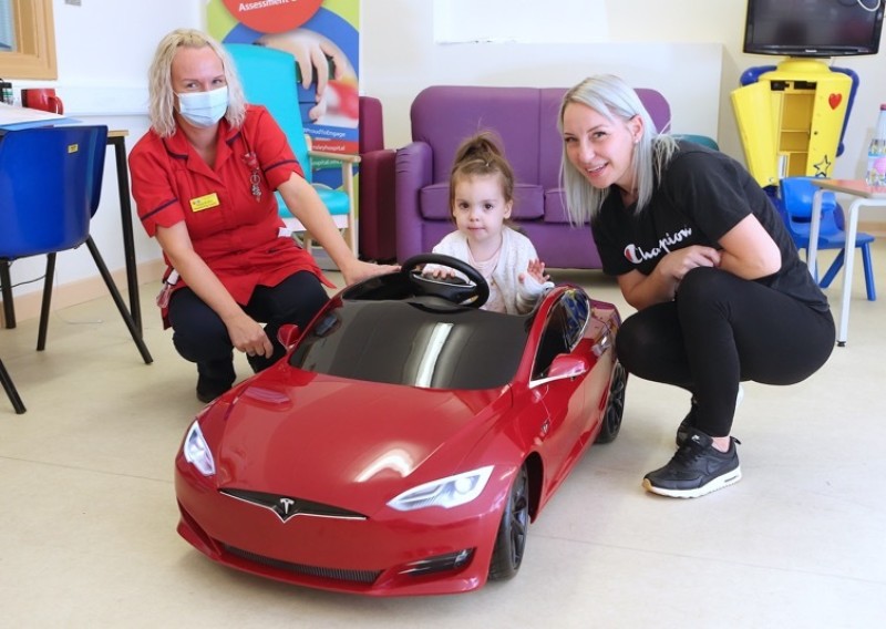 Main image for Miniature Tesla car donated to children’s ward