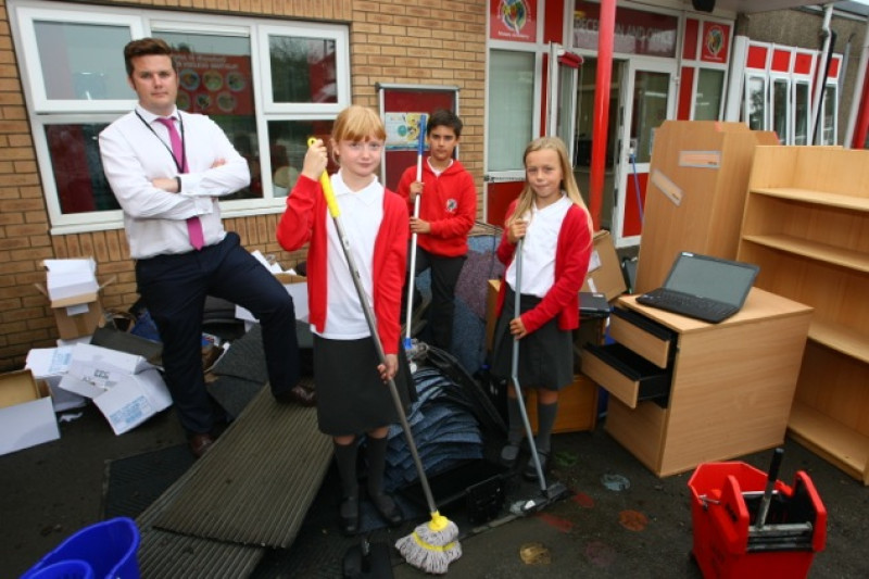 Main image for Storm leaves school flooded