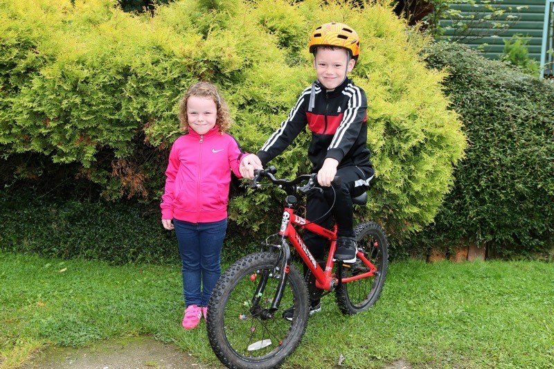 Main image for Young siblings raise cash for cancer charity