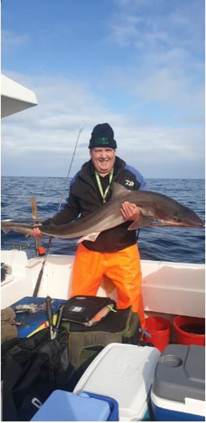 Steve Thornton with his captured tope shark.