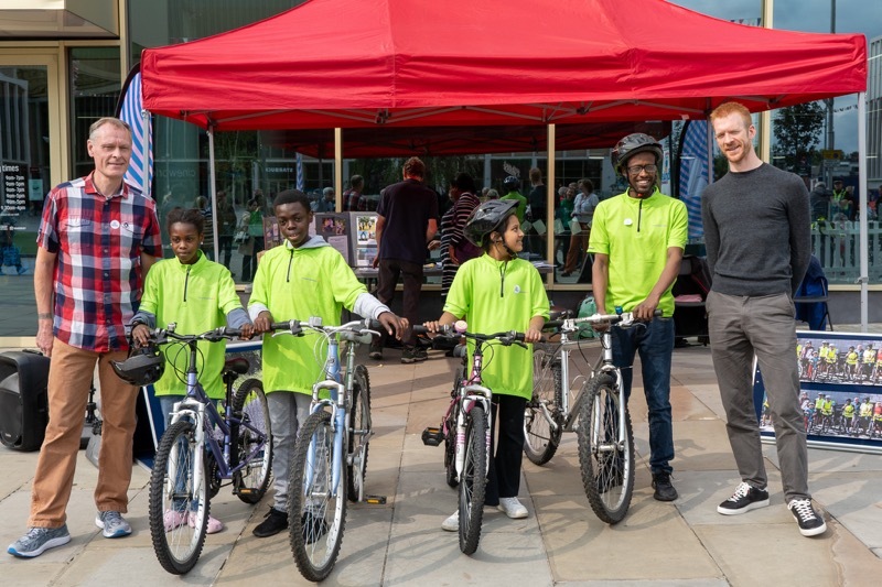 SPECIAL BIKE: Ed Clancy, Alex Simon and some of the refugees.