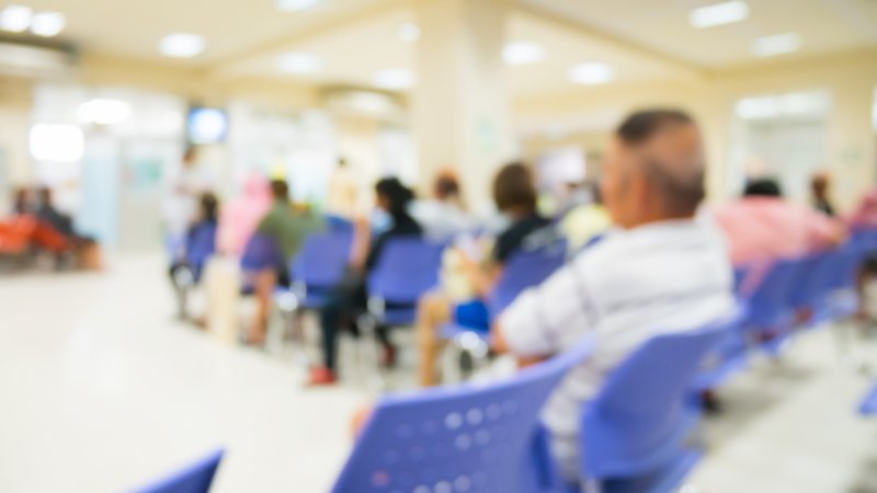 Busy waiting room, hospital, doctors Stock Image